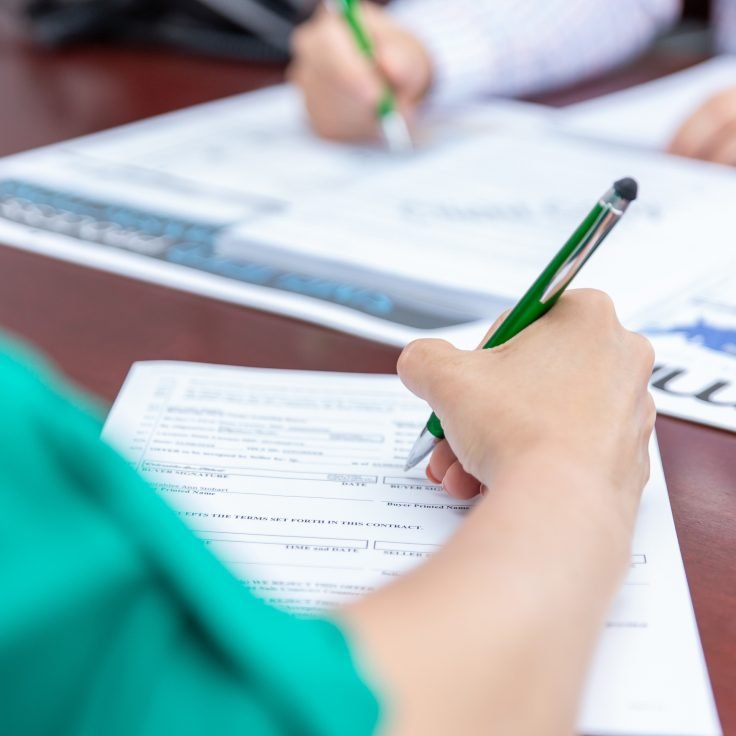 Client filling out paperwork