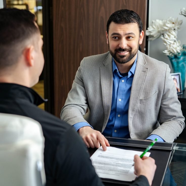 Client reviewing refinancing options